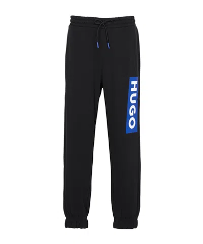 HUGO BOSS LOGO-PRINT COTTON TRACK PANTS