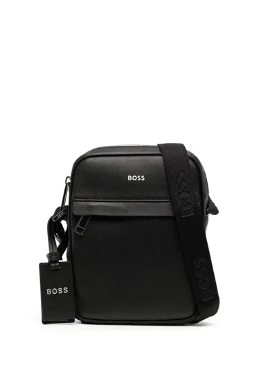 HUGO BOSS LOGO-PRINT LEATHER MESSENGER BAG
