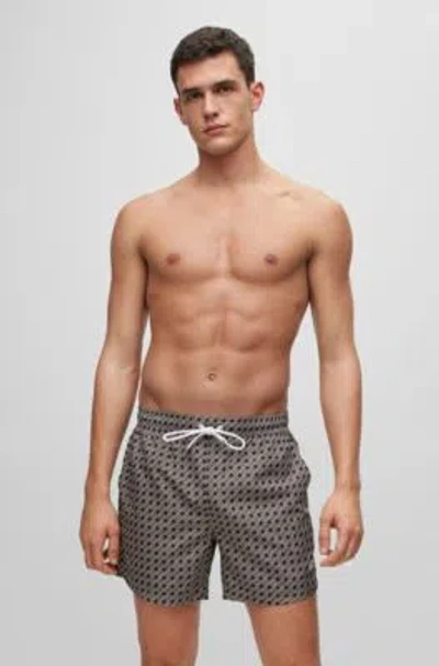 Hugo Boss Logo Swim Shorts With All-over Seasonal Pattern In Beige