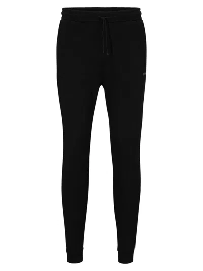 HUGO BOSS MEN'S COTTON TRACKSUIT BOTTOMS WITH CURVED LOGO