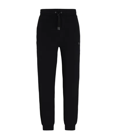 Hugo Boss Minimalist Solid Color Sports Pants In Black