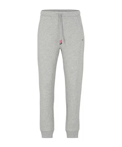 Hugo Boss Minimalist Versatile Solid Color Sports Pants In Blue