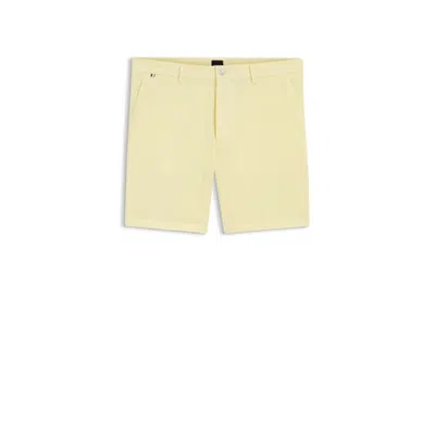 Hugo Boss Modern-fit Shorts In Stretch-cotton Twill In Yellow
