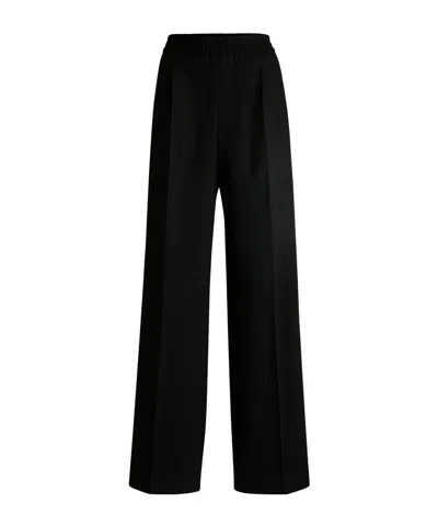 Hugo Boss Pinstriped Trousers In Black