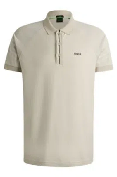 Hugo Boss Polo Shirt With Embossed Stripe Artwork In Light Beige