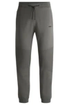 Hugo Boss Regular-fit Knitted Tracksuit Bottoms With Stripes And Branding In Light Grey