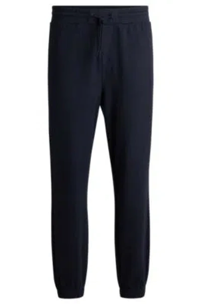Hugo Boss Regular-fit Tracksuit Bottoms In Performance Fabric In Dark Blue