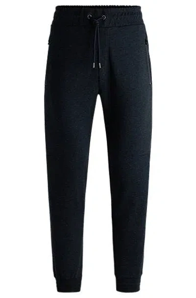 Hugo Boss Regular-fit Tracksuit Bottoms In Stretch Flannel In Dark Blue