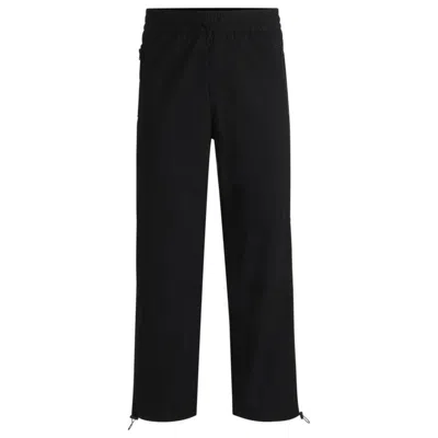 Hugo Boss Regular-fit Trousers In Paper-touch Cotton In Black