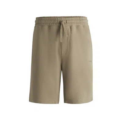 Hugo Boss Relaxed-fit Shorts In Cotton Terry With Logo Print In Brown