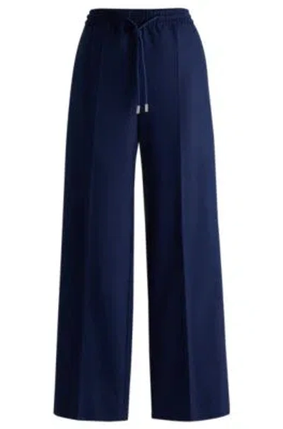 Hugo Boss Relaxed-fit Trousers With A Wide Leg In Light Blue