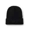 Hugo Boss Ribbed Beanie Hat With Handwritten Logo In Black