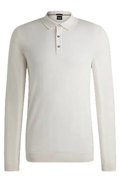 Hugo Boss Logo-embroidered Virgin Wool Polo Shirt In White