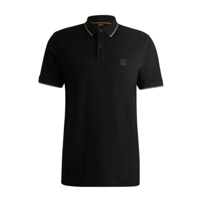 Hugo Boss Slim-fit Polo Shirt In Washed Stretch-cotton Piqu In Black