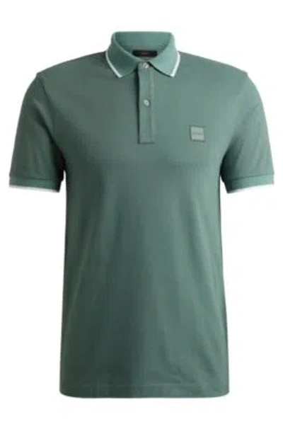 Hugo Boss Slim-fit Polo Shirt In Washed Stretch-cotton Piqu In Green