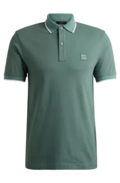 Hugo Boss Slim-fit Polo Shirt In Washed Stretch-cotton Piqu In Light Green