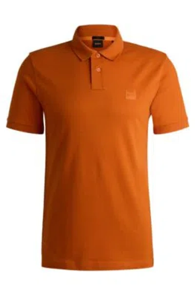 Hugo Boss Stretch-cotton Slim-fit Polo Shirt With Logo Patch In Light Orange
