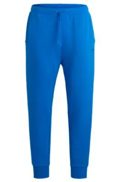 Hugo Boss Stretch-cotton Tracksuit Bottoms With Logo Print In Light Blue