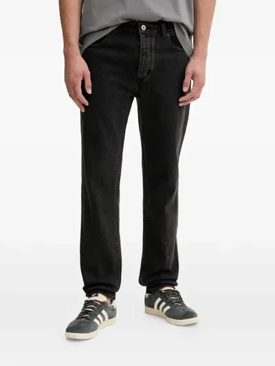 Hugo Boss Tapered-fit Patch Pocket Jeans In Black