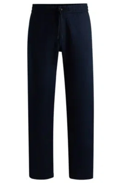 Hugo Boss Tapered-fit Trousers In A Linen Blend In Dark Blue