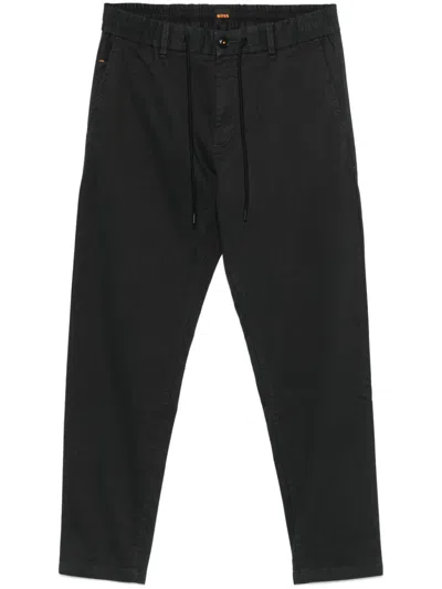 Hugo Boss Tapered Trousers In Schwarz
