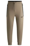 Hugo Boss Tracksuit Bottoms With 3d-molded Logo In Light Green