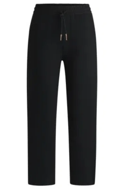 Hugo Boss Tracksuit Bottoms With Adjustable Hems In Black