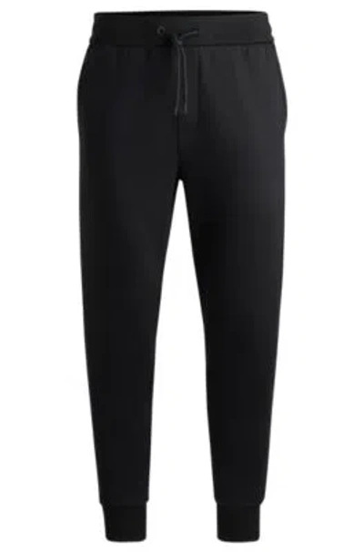 Hugo Boss Tracksuit Bottoms With Contrast Insert In Black