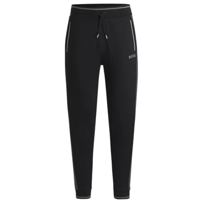 Hugo Boss Tracksuit Bottoms With Contrast Piping In Black