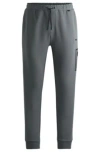 Hugo Boss Tracksuit Bottoms With Decorative Reflective Logo In Khaki
