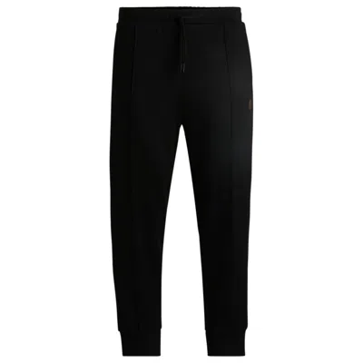 Hugo Boss Tracksuit Bottoms With Double B Monogram In Black