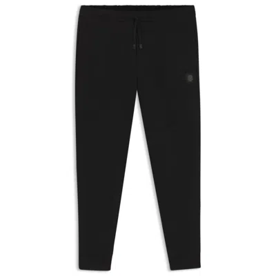 Hugo Boss Tracksuit Bottoms With Double B Monogram In Black