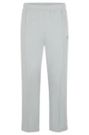 Hugo Boss Tracksuit Bottoms With Logo Artwork In Light Grey
