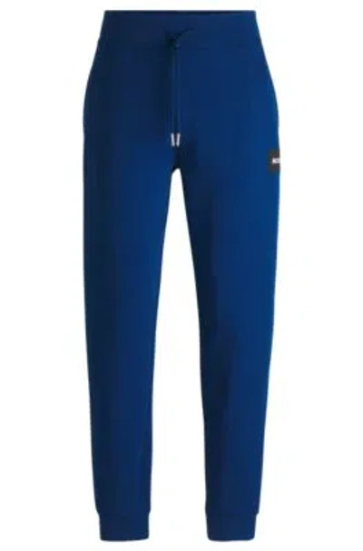 Hugo Boss Tracksuit Bottoms With Logo Label In Light Blue