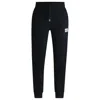 Hugo Boss Tracksuit Bottoms With Metallic Logo Label In Black