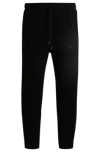 Hugo Boss Tracksuit Bottoms With Mirror-effect Logo In Black