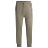 Hugo Boss Tracksuit Bottoms With Mirror-effect Logo In Green