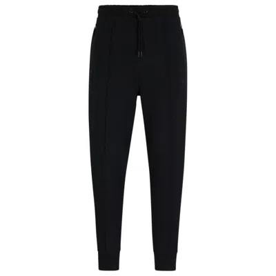 Hugo Boss Tracksuit Bottoms With Pixelated Details In Black