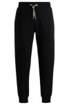Hugo Boss Tracksuit Bottoms With Signature-stripe Cords In Black