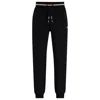 Hugo Boss Tracksuit Bottoms With Stripes And Logos In Black