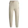 Hugo Boss Tracksuit Bottoms With Tape Inserts In Beige