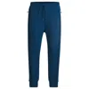 Hugo Boss Tracksuit Bottoms With Tape Inserts In Blue
