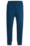 Hugo Boss Tracksuit Bottoms With Tape Inserts In Light Blue