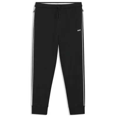 Hugo Boss Triangle-jacquard Track Pants With Rubberized Logo In Black