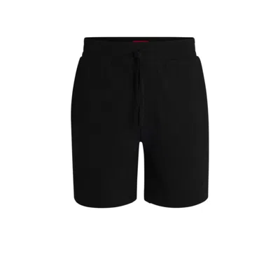 HUGO BOSS WAFFLE-STRUCTURED PAJAMA SHORTS WITH EMBROIDERED LOGO