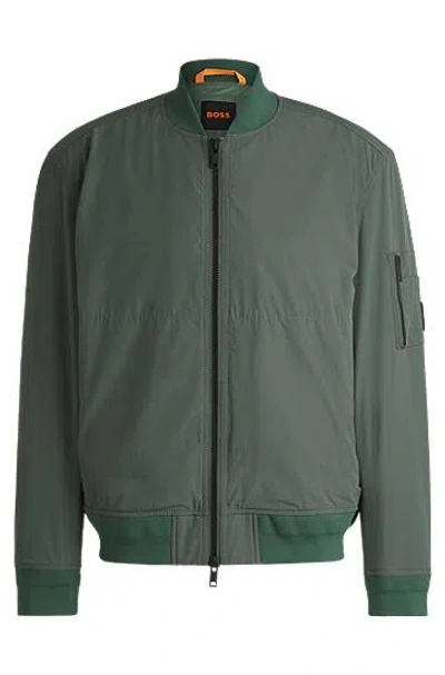 Hugo Boss Water-repellent Jacket With Zipped Sleeve Pocket In Green