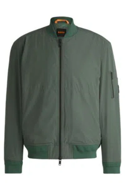 Hugo Boss Water-repellent Jacket With Zipped Sleeve Pocket In Light Green