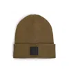 Hugo Boss Wool Beanie Hat With Logo Badge In Green