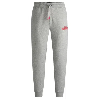 Hugo Boss X Nfl Signature-tape Tracksuit Bottoms With Special Branding In Gray