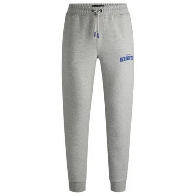 HUGO BOSS X NFL SIGNATURE-TAPE TRACKSUIT BOTTOMS WITH SPECIAL BRANDING